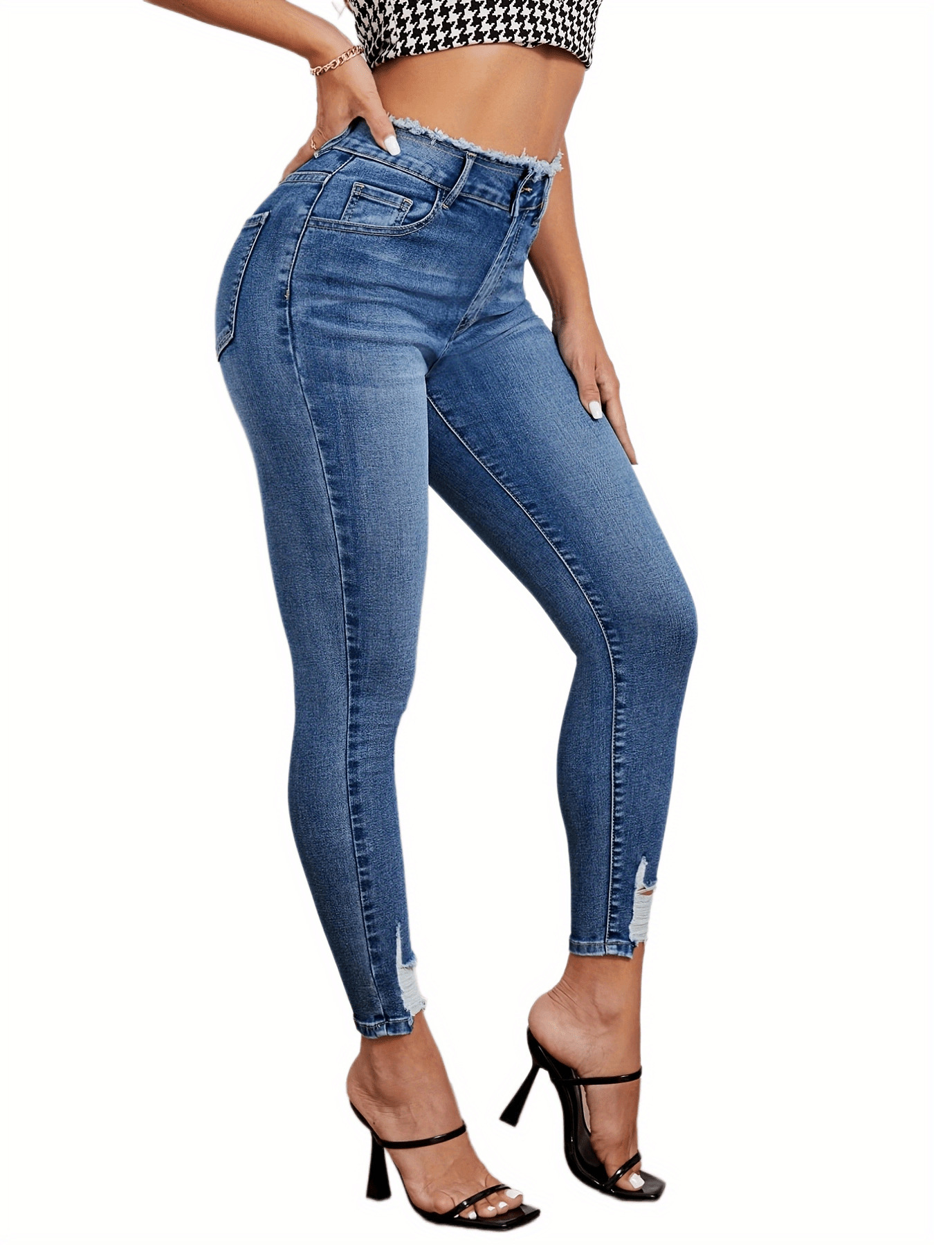High Waist ripped elastic Jeans with Distressed Hem Detail